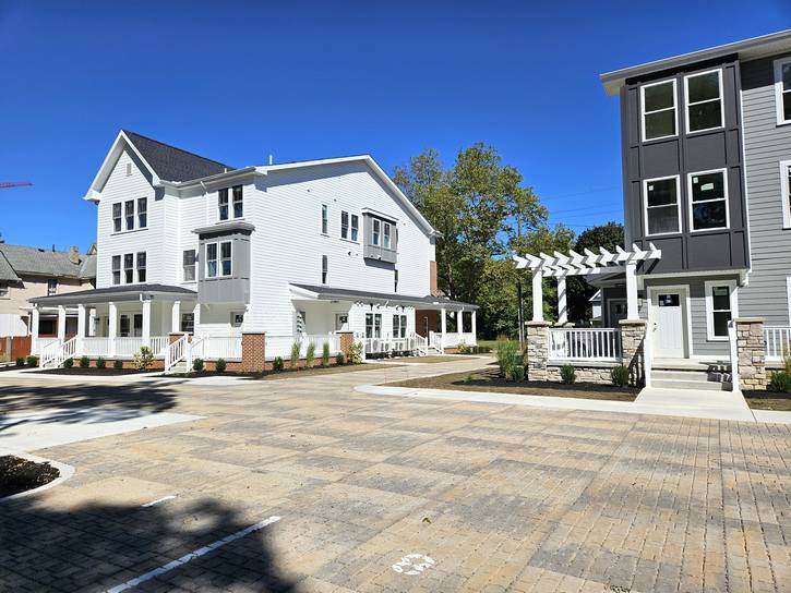 A rear view of the 89th Rising townhomes and apartments.